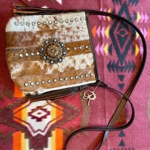 Brand New, never been used Raviani cowhide and leather bag.